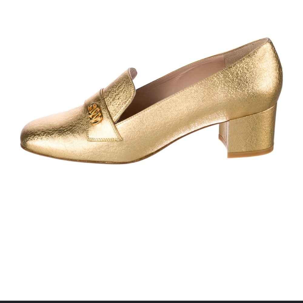 Stuart Weitzman Riela 50 gold textured metallic leather loafers.